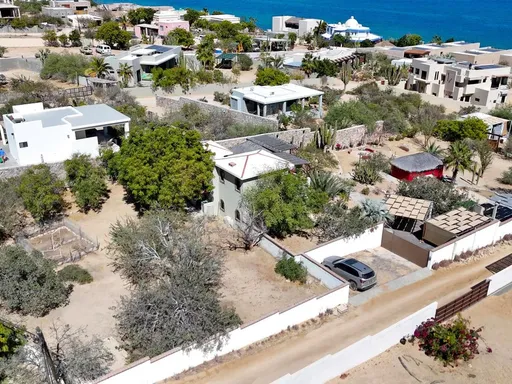 Property located on Beach Side of Main Road Steps from the Beach